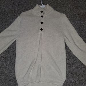 A men's small cream sweater